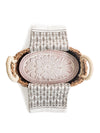 Natural terracotta bread warmer stone inside a linen-lined basket