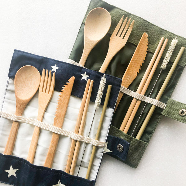 Portable bamboo utensil kit styled for an outdoor picnic, eco-friendly plastic-free travel dining