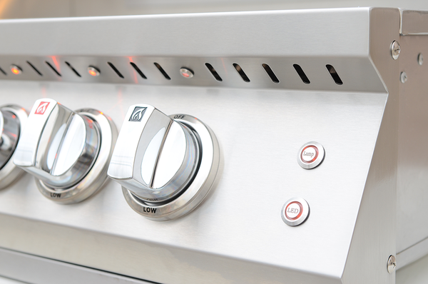 Close-up of KoKoMo grill control knobs and buttons labeled Lamp and LED