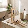 "Natural bamboo toothbrush resting on a clean bathroom counter