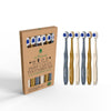 Eco-friendly toothbrush with charcoal bristles in sustainable craft paper packaging