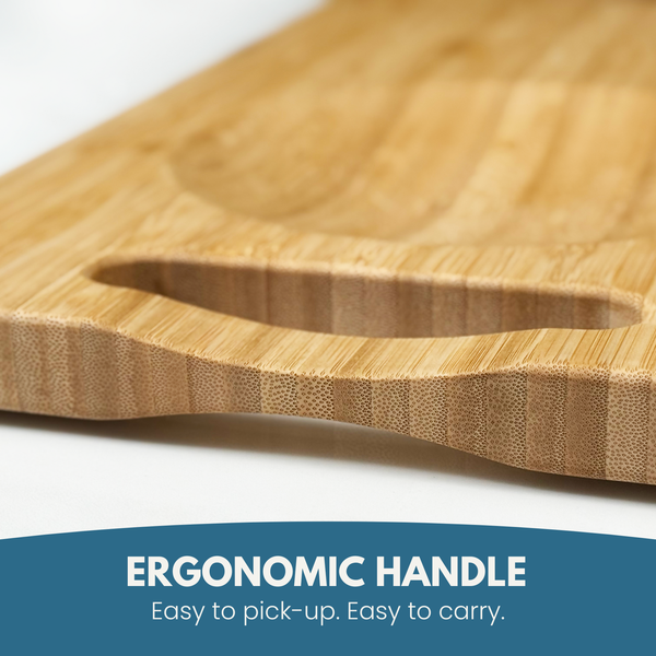 Close-up of the shaped carrying handle on the NULU bamboo cutting board