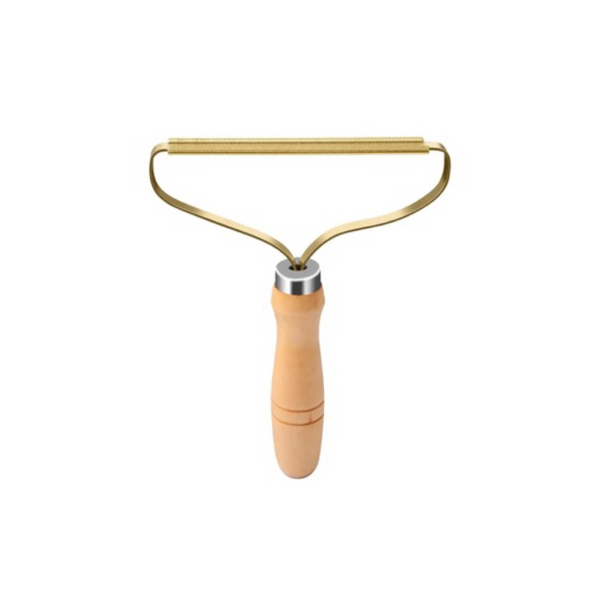Gold metal roller with wooden handle on a white background