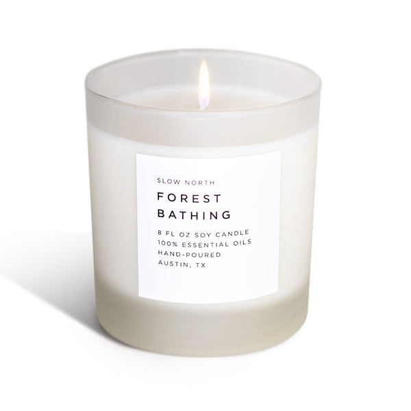 Frosted candle with 'Slow North' label