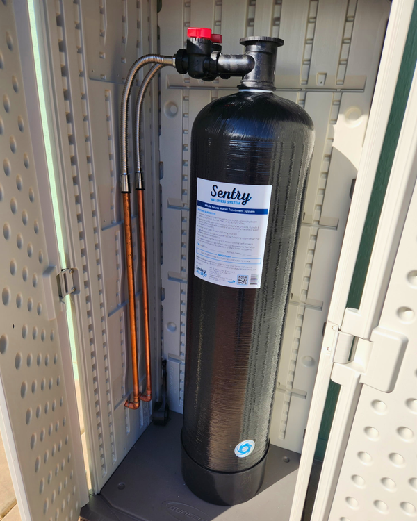 Sentry Whole House Wellness System installed on a home's water line