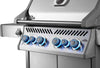 Close-up of Napoleon Rogue PRO-S 525 blue-lit control knobs and stainless steel front panel