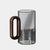 Glass mug set with ergonomic dark walnut handle, sustainable heat-resistant drinkware