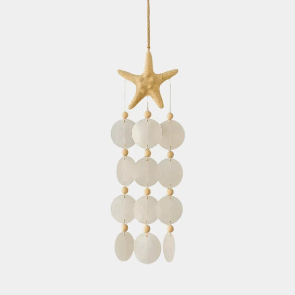 Bohemian capiz shell wind chime with white moon-shaped shells, handcrafted coastal home decor