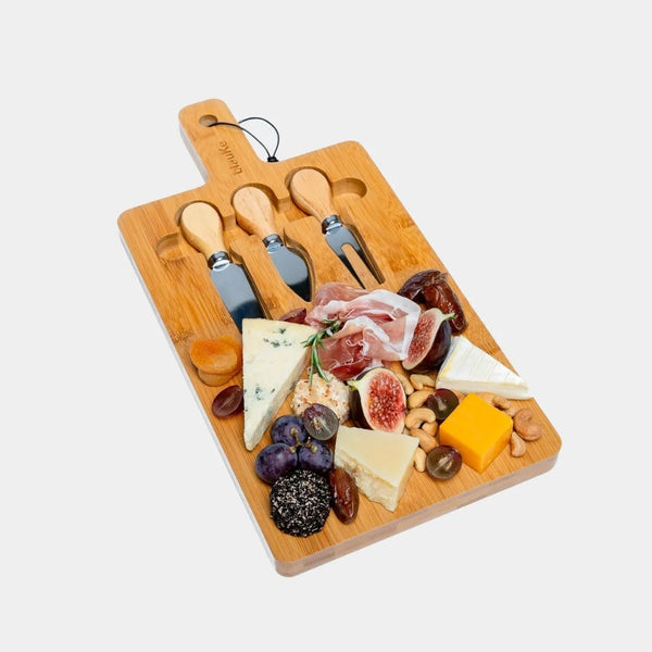 Close-up of integrated magnetic tool storage on bamboo cheese board with stainless steel knives