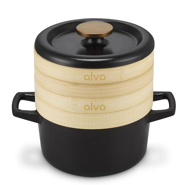 Black Alva Dutch oven with two stacked bamboo steamer baskets and a black lid with a gold-toned knob
