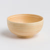 Wooden bowl on a white background