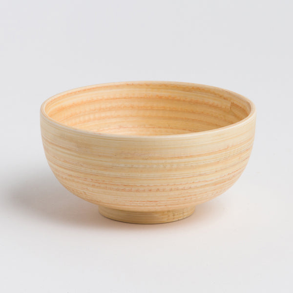 Wooden bowl on a white background