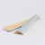 "Close-up detail of the smooth ergonomic handle and artisanal finish of TIA servers"