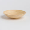 Close-up of smooth natural bamboo grain and artisan finish on DIA small plate"