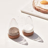 "Boeien by Puik salt and pepper mill set styled on a modern dining table"