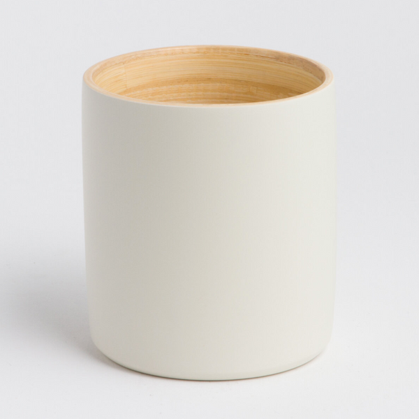"Close-up of the smooth bamboo rim and artisanal finish of the LY mug"