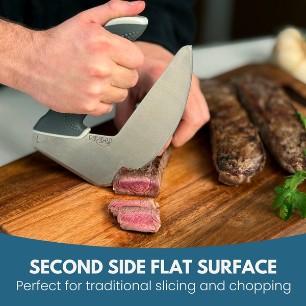 Person slicing steak with a NULU knife on the cutting board’s flat reverse side