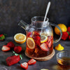 Thermo Glass Teapot filled with blooming herbal tea"