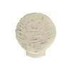 Selenite bubble lamp glowing on a nightstand, calming ambient light for peaceful bedroom decor