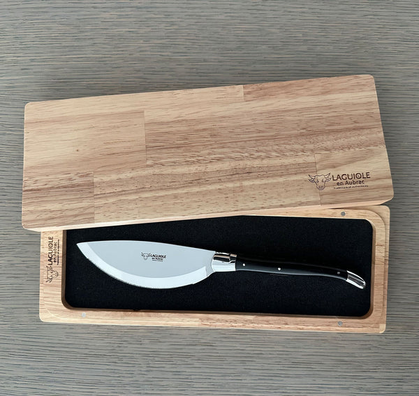 Laguiole en Aubrac ebony-handled pizza knife in an open wooden presentation box with a fitted black insert