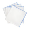 Chouchou Touch white linen napkins with blue satin-stitch edges, set of 4