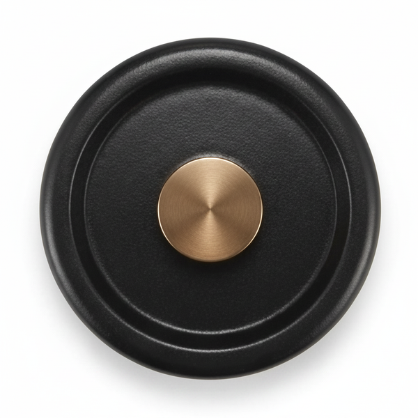 Top view of the black Alva Dutch oven lid with a round gold-toned knob