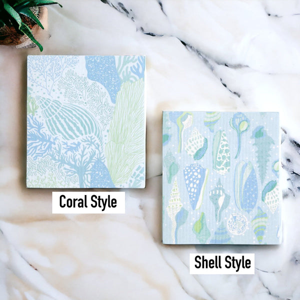 Reusable eco-friendly cleaning cloth wiping down a kitchen countertop