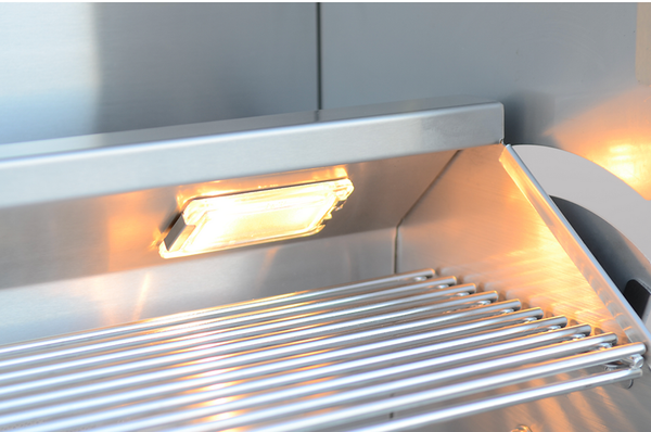 Close-up of an illuminated interior lamp above the KoKoMo grill warming rack