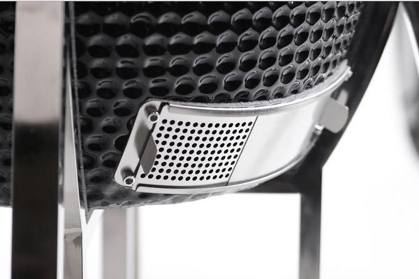Close-up of the adjustable lower airflow vent on the black KoKoMo ceramic Kamado grill