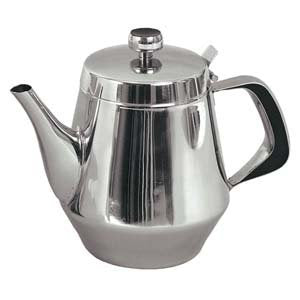 Stainless steel gooseneck kettle on a stovetop with pour-over coffee gear"