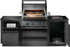 Front view of OASIS kitchen with rotisserie spit, glowing rear burner, paper towel holder and open storage