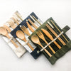 Beige/Navy/Green canvas pouch containing portable eco-friendly bamboo cutlery set