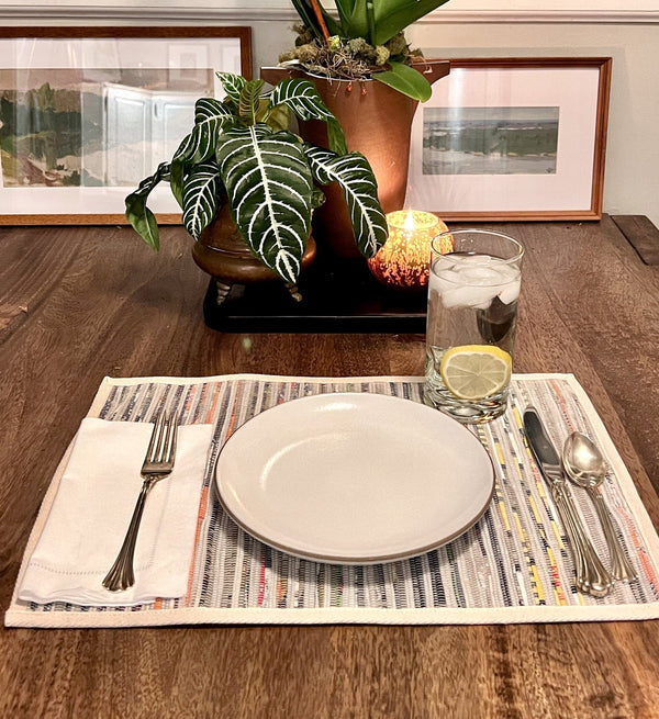 Set of 4placemats on a rustic wooden table"