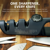 NULU adjustable sharpener surrounded by knife blades and scissors, with sharpening-angle guidance printed on its side