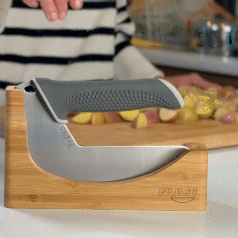 NULU acacia knife dock with curved blade-storage groove and engraved logo, shown without a knife