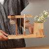 Sustainable wood desk organizer styled with pens and accessories, perfect eco-friendly gift for professionals