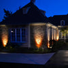 House exterior with strategic lighting at night