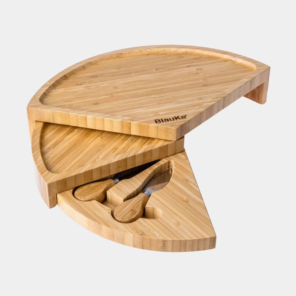 Close-up of bamboo cheese board showing hidden slide-out drawer with 3 stainless steel cheese knives