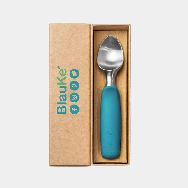 Blue-handled spoon in a Blauke branded box on a light gray background