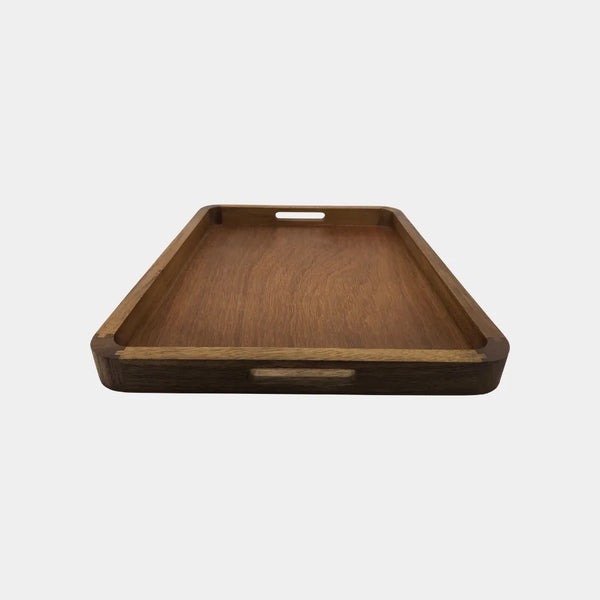 Close-up of integrated cutout handles and rich natural wood grain on solid acacia serving tray