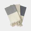 Set of Herringbone organic cotton hand towels in Champagne and Black colorways