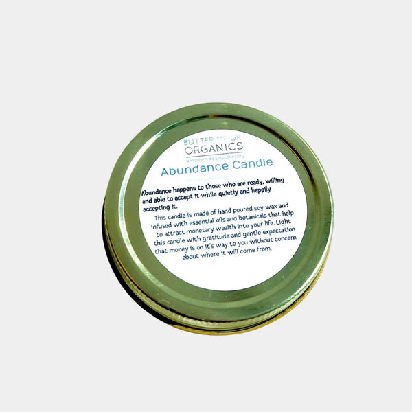 Butter Organics Abundance Candle lid on a white background