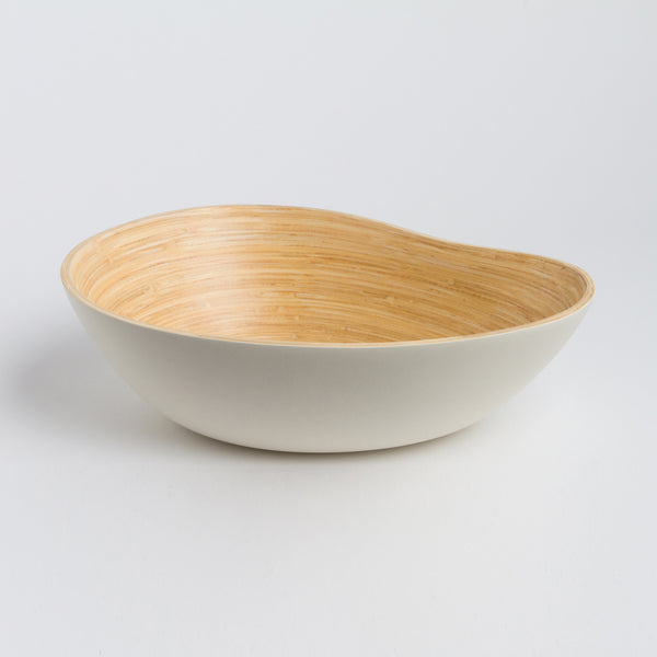Bowl with wooden interior and white exterior on a light gray background