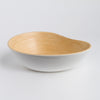 SOAI hand-crafted bamboo serving bowl in mango-inspired asymmetrical shape for eco-friendly kitchen dining."