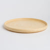 Round wooden Bamboo Tray on a light gray background
