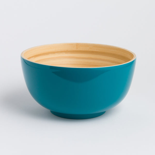 Large Teal bowl with wooden interior on a white background