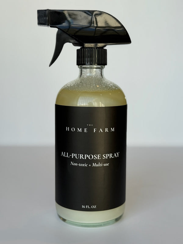 Sustainable all-purpose cleaning spray in a modern glass bottle