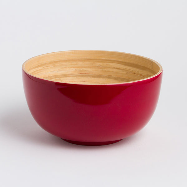 Large Bowl with red exterior and wooden interior on a white background