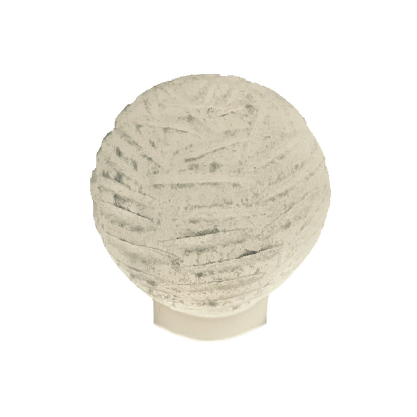 Selenite bubble lamp glowing on a nightstand, calming ambient light for peaceful bedroom decor