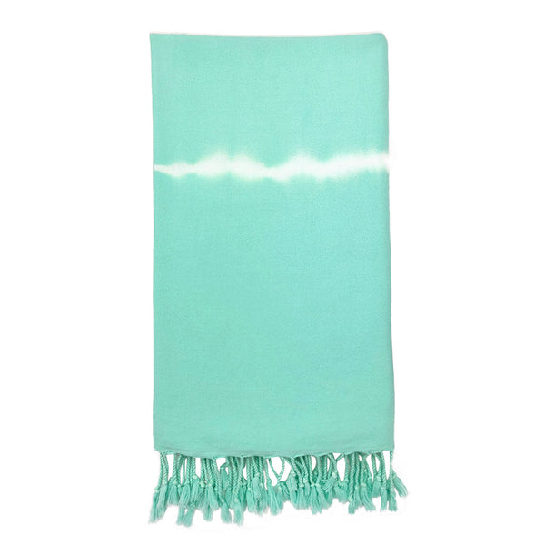 Mint tie dye Turkish beach towel with hand-knotted tassels.